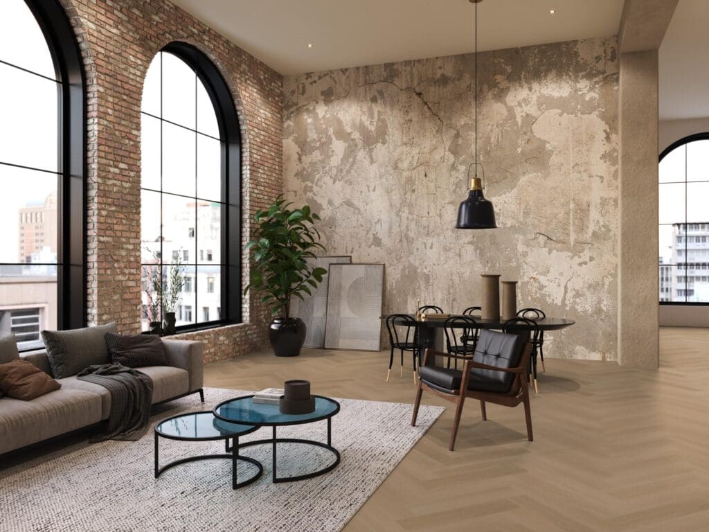 Donkere visgraat pvc-vloer in een loft met een zithoek